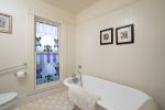 The 3rd upstairs bath is shared with bedrooms 3 and 4 and has a clawfoot tub